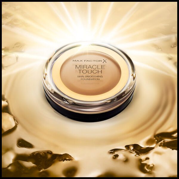 Основа тональная Max Factor Miracle Touch natural  тон 70 фото №6